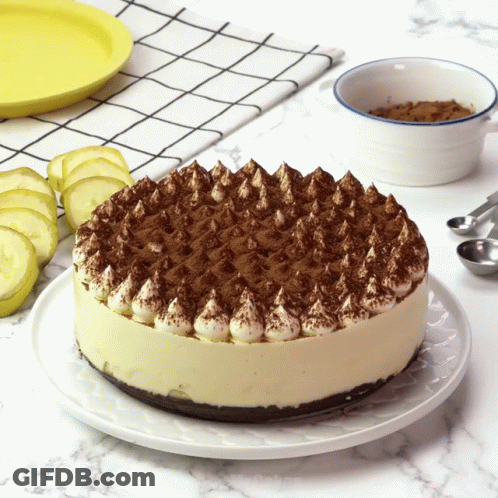 Cake With Whipped Cream And Chocolate Sprinkles GIF