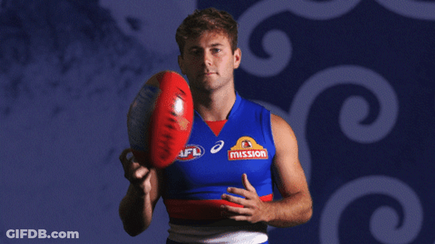 Caleb Daniel From Western Carolina Holding Ball For Pose GIF