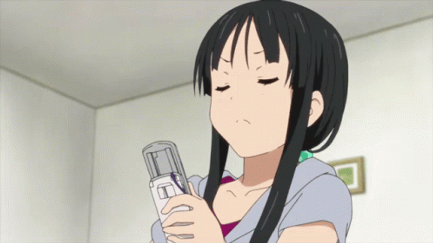 Calling Angry Anime Girl Mio Akiyama GIF