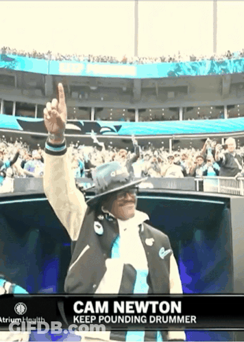 Cam Newton Keep Pounding Drummer Is Shown In A Stadium GIF