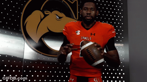 Camels Football Player Holding Football GIF