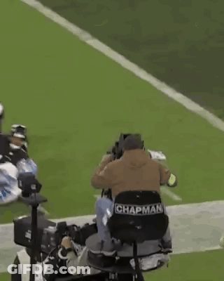 Cameraman Sitting On Football Field GIF