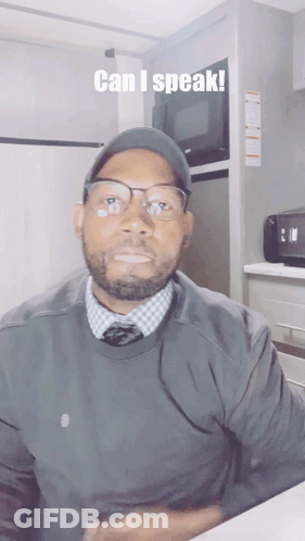 Can I Speak Man With Glasses And Hat GIF