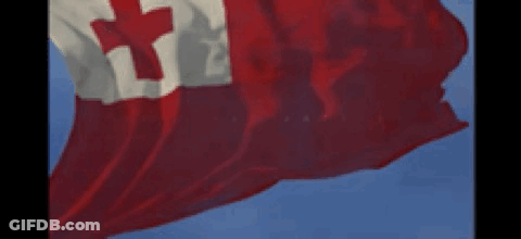 Canadian Flag Waving Against Blue Sky GIF