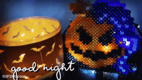 Candle And Pumpkin Saying Good Night GIF