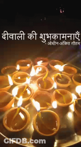 Candles Lit On Tray With Greeting GIF