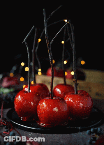 Candy Apples With Sticks GIF