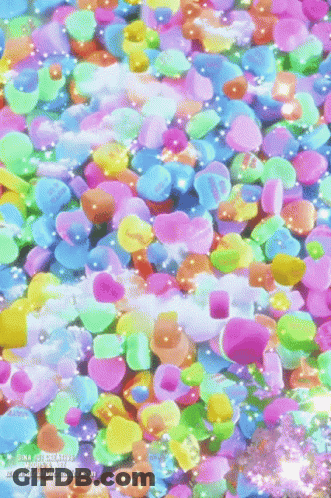 Candy Hearts Floating In Water With Gina Watermark GIF