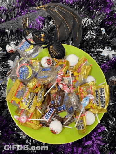 Candy Plate With Haribo Goldbears And Snickers GIF