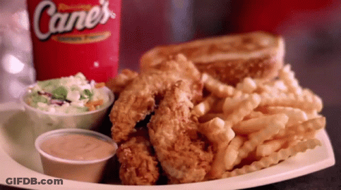 Cane's Soda Next To Fried Chicken And French Fries GIF