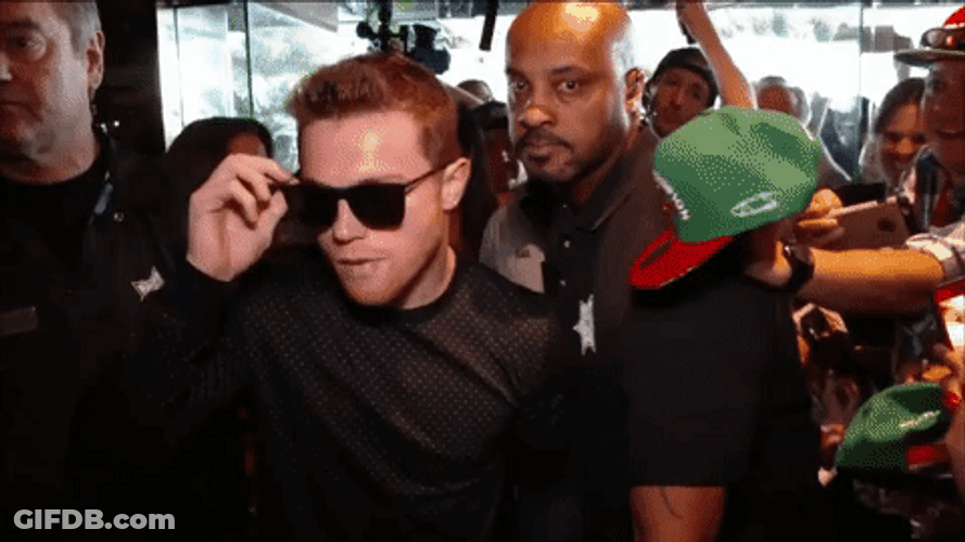 Canelo Álvarez Taking Off Sunglass Walking With Security GIF