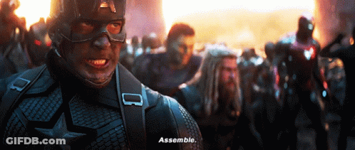 Captain America Is Standing In Front Of A Crowd And Says Assemble GIF