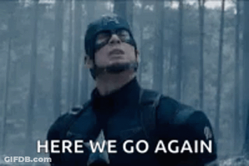 Captain America Is Standing In The Woods With The Words `` Here We Go Again '' Written On The Screen . GIF