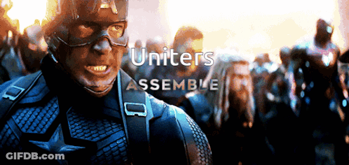 Captain America Stands In Front Of A Group Of People With The Words Uniters Assemble Above Him GIF