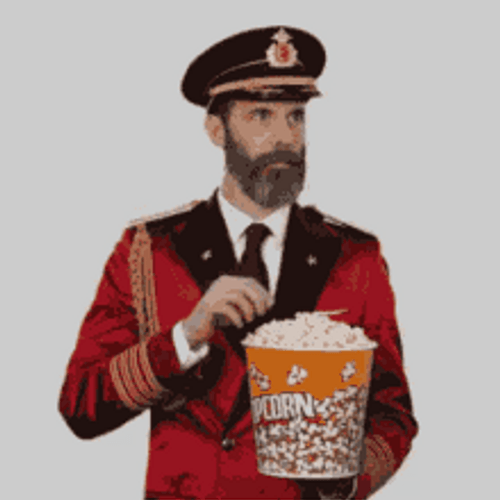 Captain Eating Popcorn GIF