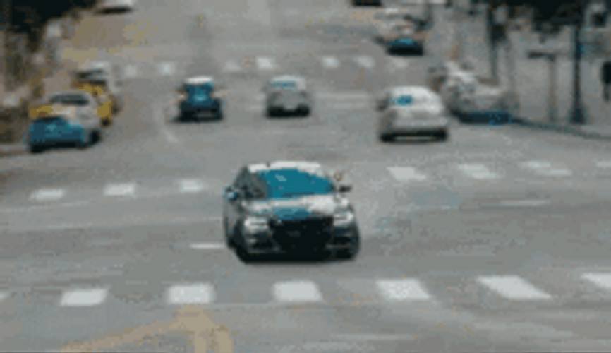 Car Drifting On Busy City Streets GIF