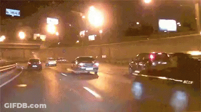 Car Driving Down Highway At Night GIF