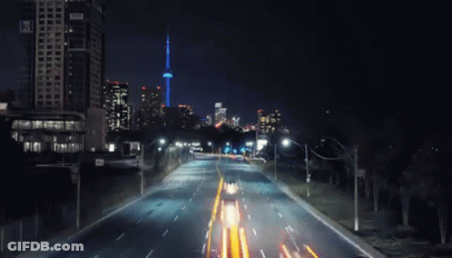 Car Driving Down Highway At Night GIF