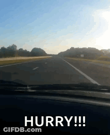 Car Driving Down Highway Saying Hurry GIF