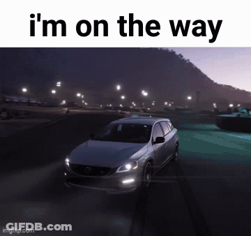 Car Driving Down Road At Night Saying I'm On The Way GIF