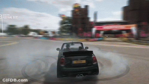 Car Driving Down Road With Festival Site Sign GIF