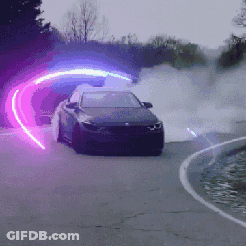 Car Driving Down Road With Purple Light GIF