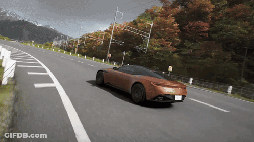 Car Driving Down Road With Trees GIF
