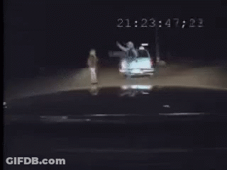 Car Driving Down Street At Night 2123 51 21 GIF
