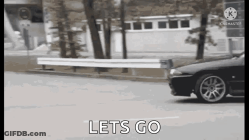 Car Driving Down Street Lets Go GIF