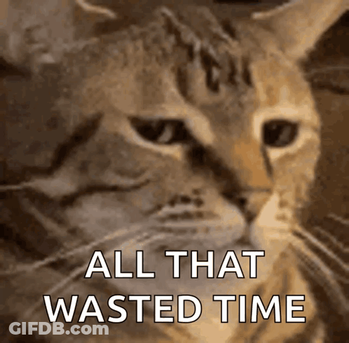 Car Driving Down Street Next To Trash Can In Rain GIF