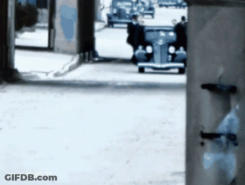 Car Driving Down Street With Cravello2021 Sign GIF