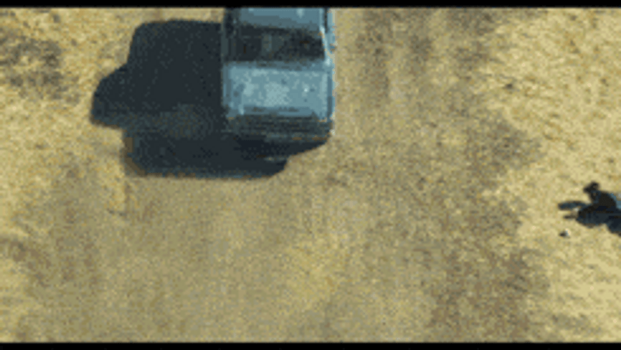 Car Driving Off Cliff And Exploding GIF