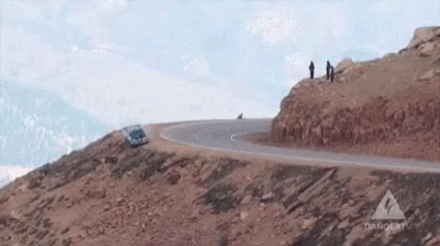 Car Driving Off Cliff And Rolling Around GIF