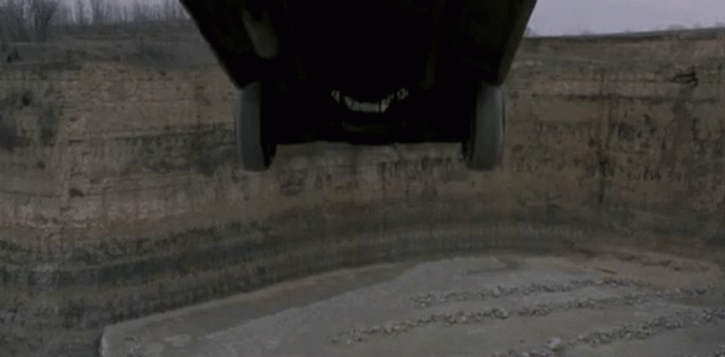 Car Driving Off Cliff Underside View GIF