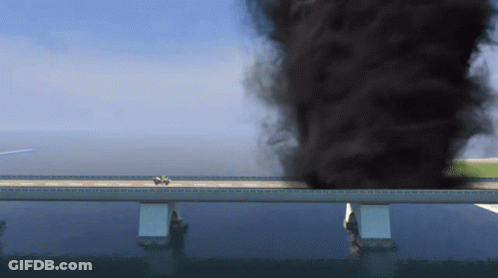 Car Driving On Bridge With Smoke From Water GIF