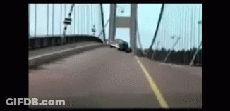 Car Driving Over Bridge In Blurry Video GIF
