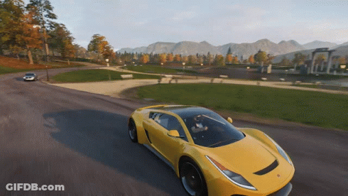Car Driving Past Festival Site Billboard GIF
