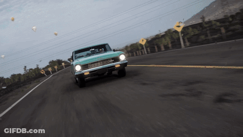 Car Driving Past Yellow Right Sign GIF