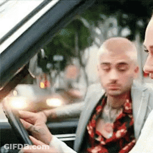 Car Driving Woman And Man Looking Back GIF