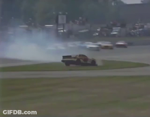Car Flying Through Air On Race Track GIF