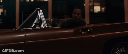 Car Flying Through Air With Building GIF