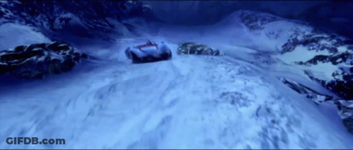 Car Going Down Snow Covered Hill GIF