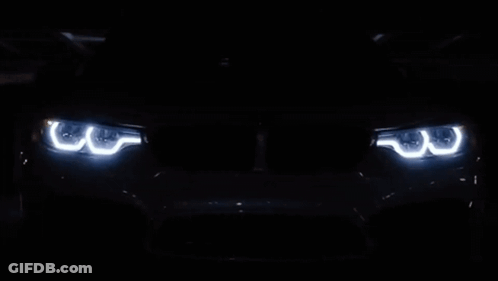 Car Headlights Lit Up Close Up GIF