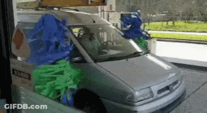 Car In Car Wash With Solarized Sign GIF