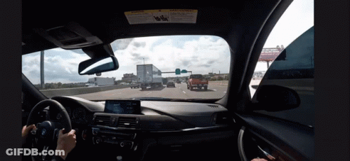 Car Interior With Warning Sign On Visor GIF