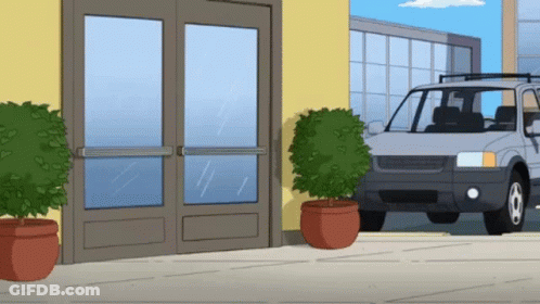 Car Parked In Front Of Building GIF