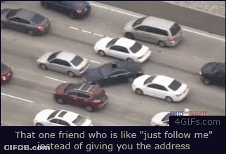 Car Squeezing Through Traffic GIF