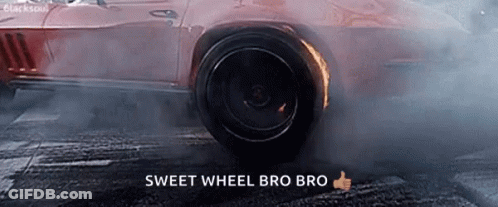 Car With Burning Tire And Smoke GIF