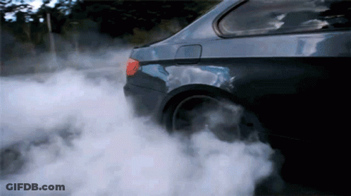 Car With Smoke From Tire GIF