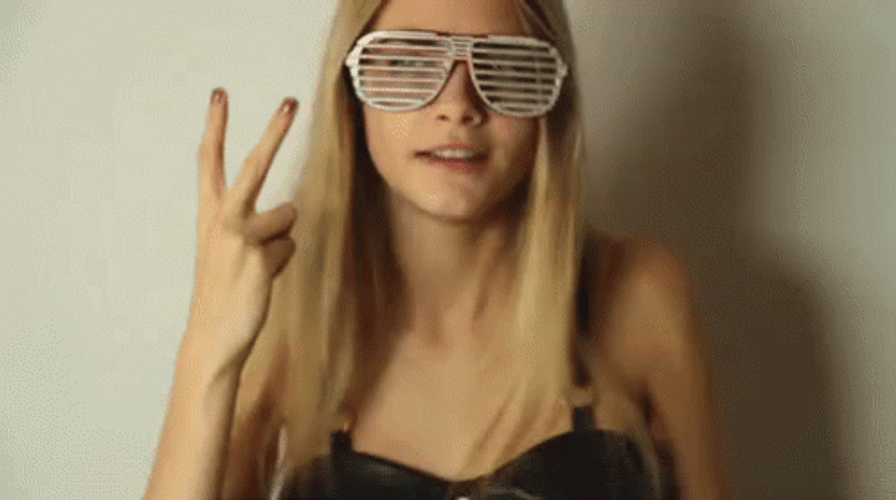 Cara Delevingne Dancing Peace Sign GIF